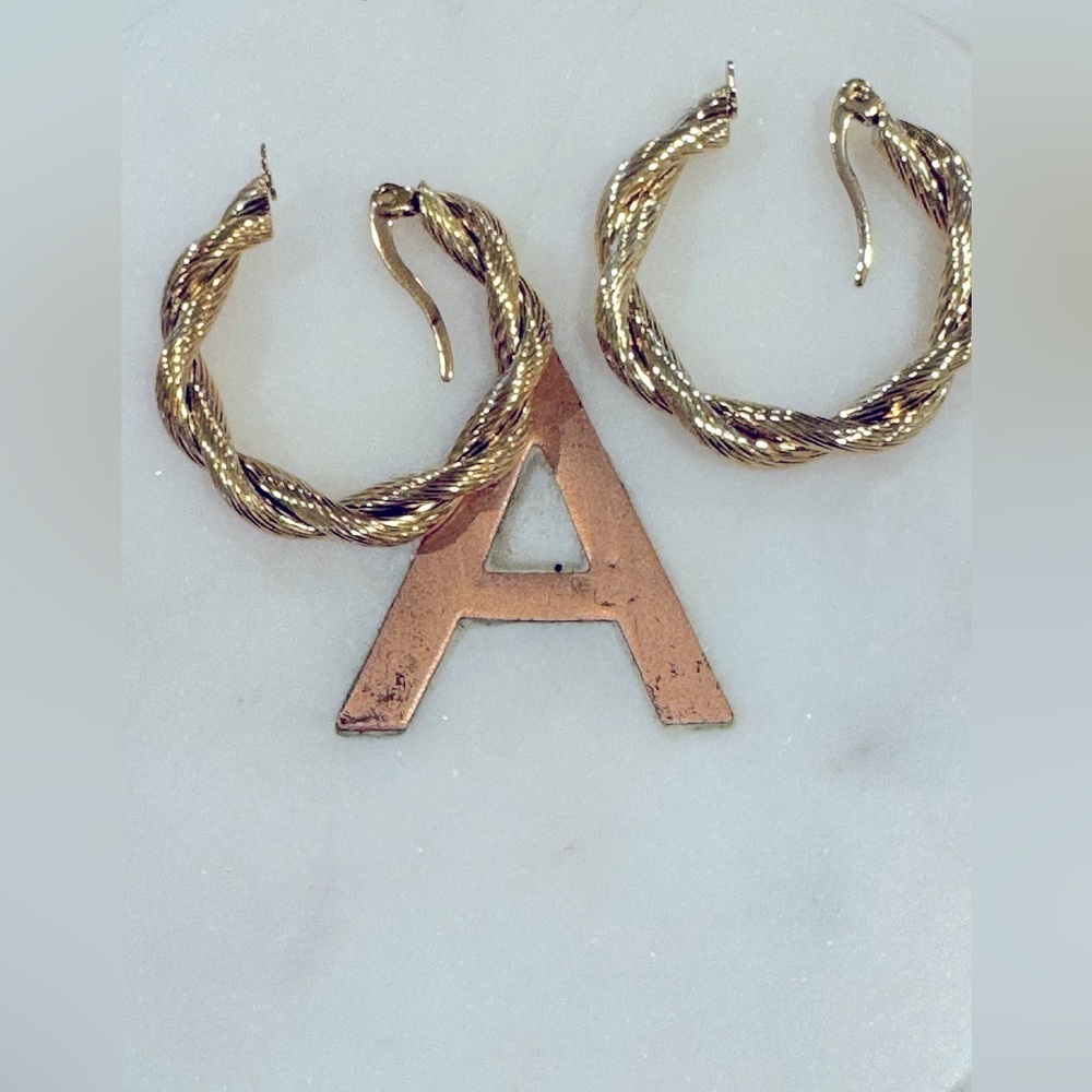 Petite Moments Braided Hoop earrings. New. Gold tone